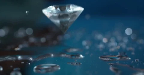 Diamond falling in slow motion shot on Phantom Flex 4K at 1000fps Stock Footage