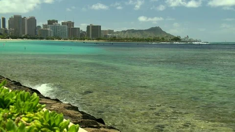 Diamond Head with Beach wall Wide shot zoom in Stock Footage 81524363