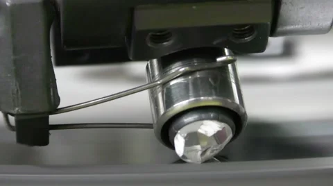 A diamond held by dop is polished Stock Footage 61293049