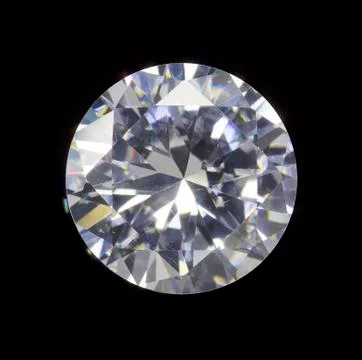 Diamond isolated on black background - realistic photo image Stock Photos