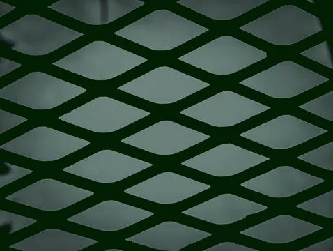 Diamond Mesh Metal Pattern with Backlit Green Glow, Abstract Industrial Textu Stock Photos