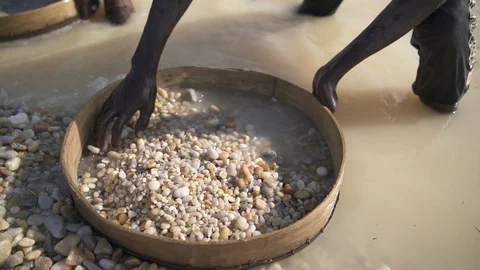 Diamond mining in a river in Sierra Leone, West Africa - 4k Stock Footage 99452862