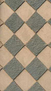 Diamond Pattern Gray and Tan Textured Stone Tiles 스톡 사진