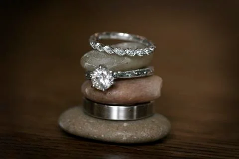 Diamond ring and rocks Stock Photos