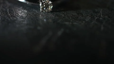 Diamond in a ring on a dark stone. Stock-Footage 310226831