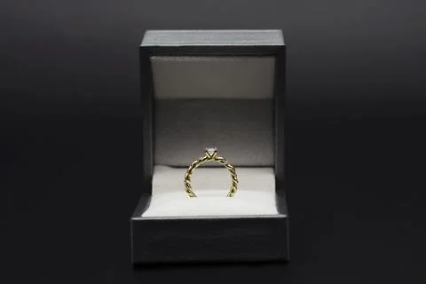 Diamond ring in gift box Stock Photos