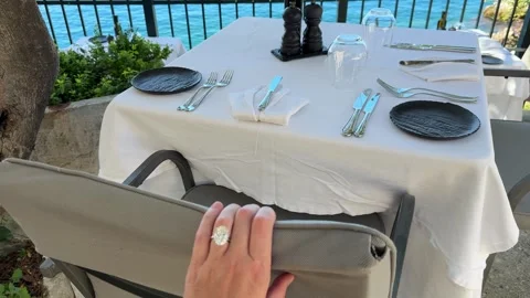 Diamond ring hand on white seaside table in Croatia Video stock 319693935