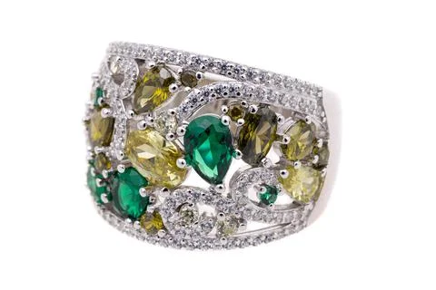 Diamond ring, isolated. Beautiful ring with different color gemstones. Stock-Fotos