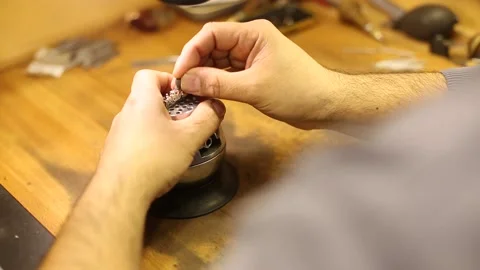 Diamond ring making. carving the ring. hand made diamond ring Stock Footage 134385327