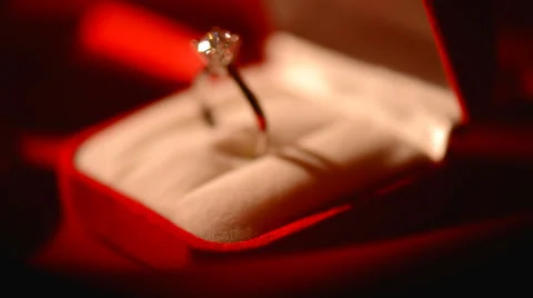 Diamond ring on red silk background Stock-Footage 34902389