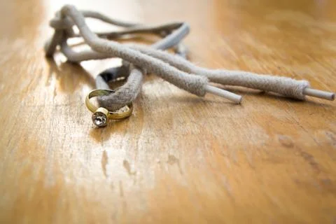 Diamond ring on a shoelace Stock Photos