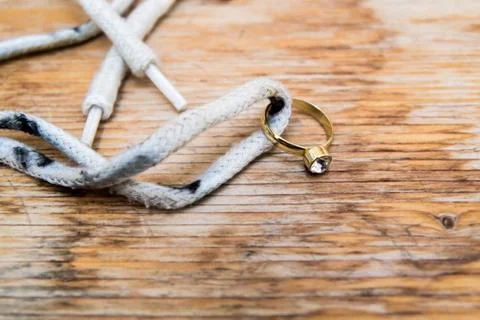 Diamond ring on a shoelace 스톡 사진