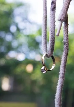 Diamond ring on a shoelace Stock Photos