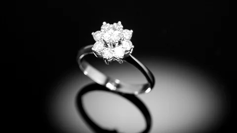 Diamond ring spinning on black background Video stock 102827382