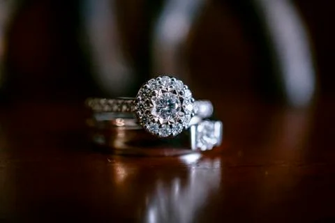 Diamond ring on the table 스톡 사진