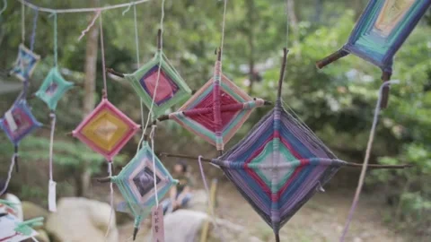 Diamond Shape Dreamcatchers Dancing in the Wind in Slow-Mo Stock Footage 157641321