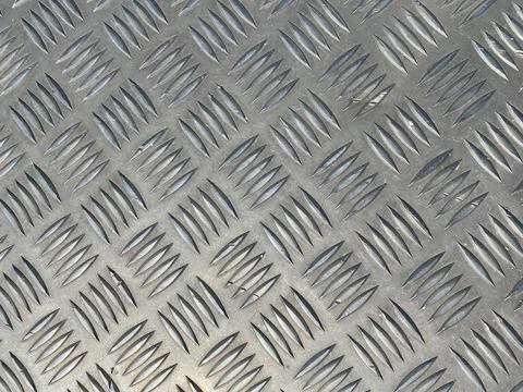 Diamond shape metal background wrap around seamless pattern heavy metal textu Stock Photos