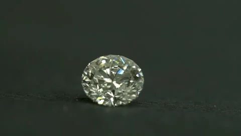 Diamond shine on the table black background. 1 carat diamond Stock Footage 139632661