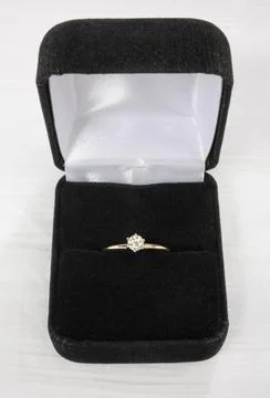Diamond solitaire ring in box Stock Photos