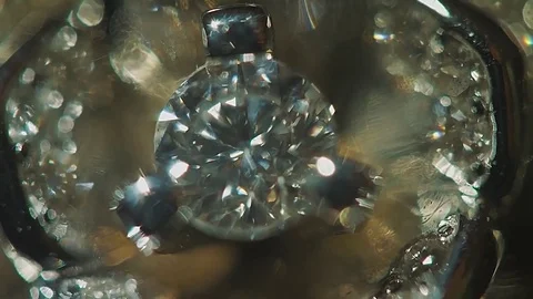 Diamond solitaire ring closeup in dark environment. Big blue diamond, closeup Stock Footage