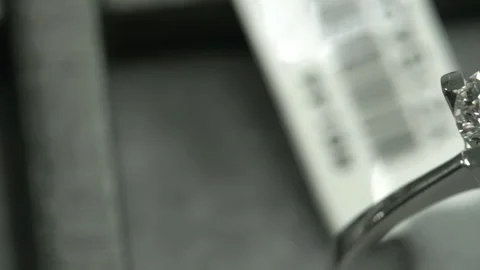 Diamond solitaire ring peak angle macro panning Stock Footage 139636289