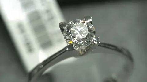 Diamond solitaire ring peak angle macro shooting Stock Footage 139640731