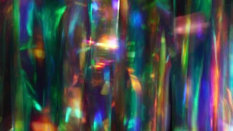 A diamond sparkling with different rainbow neon colors on a dark background Stock Illustration