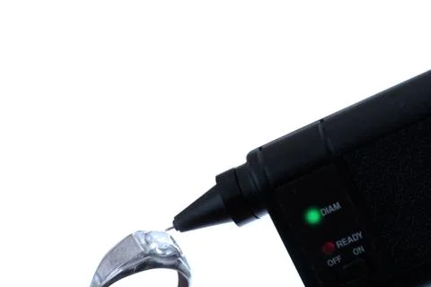 Diamond tester and ring Stock Photos