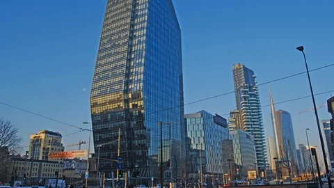 The diamond tower skyscraper with tram passing in front Stock Footage 102125117