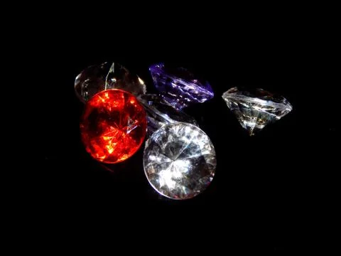 Diamonds on a black background close-up Stock Photos
