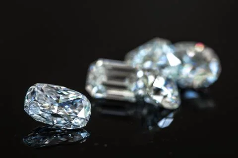 Diamonds on The Black Background Stock Photos