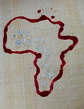 Diamonds lying on a map of Africa drawn with blood Stock Photos