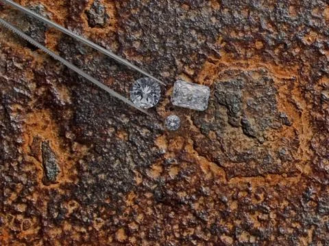 Diamonds over rusty plate Stock Photos