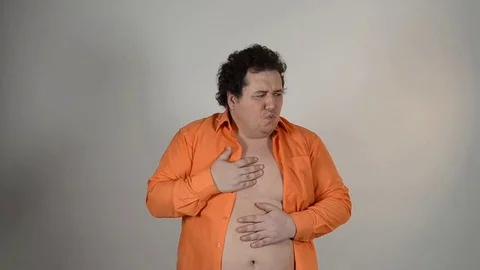 Diarrhea. Funny fat guy. | Stock Video | Pond5
