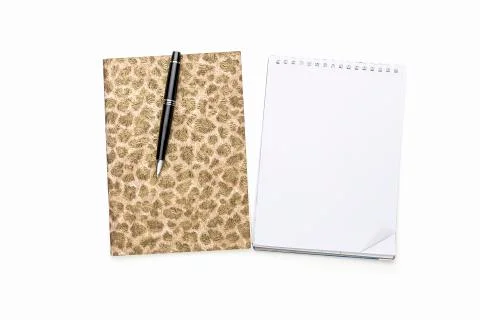 Diary and note pad with black ball pen, isolated on white Stock Photos