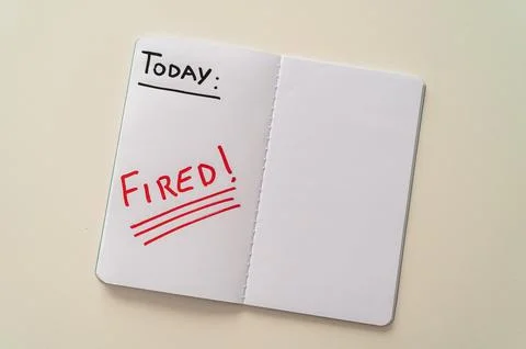 Diary page with text "Fired" Stock Photos