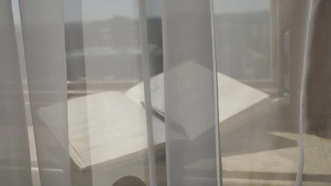 Diary with a pen at marble sill of an open window. Vídeos de archivo 109160551