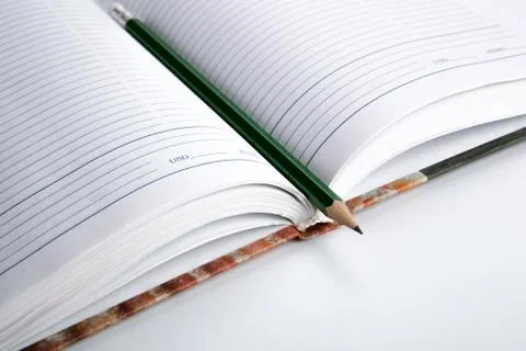Diary with pencil Stock Photos