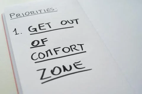 Diary with text "out of comfort zone". Stock Photos