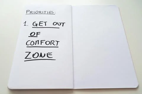 Diary with text "out of comfort zone". Stock Photos