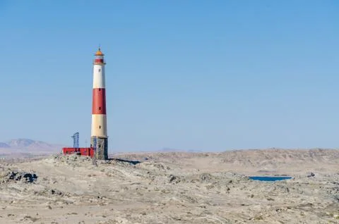Diaz Point with red and white lighthouse on Luderitz Peninsula in the Namib Stock Photos