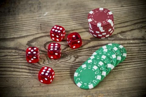 Dice and chips Stock Photos