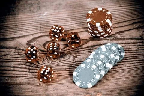 Dice and chips Stock Photos