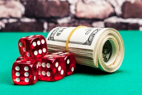 Dice and Dollars Stock Photos