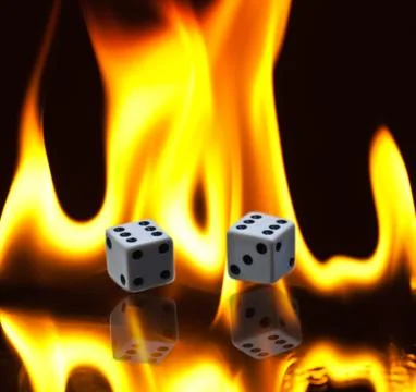 Dice And Flames Stock-Fotos