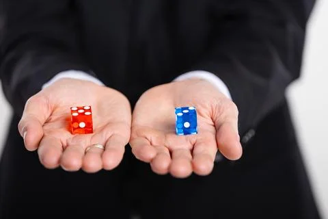 Dice are an important part of the tricks of magic artists, illusionists Stock Photos