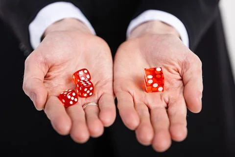 Dice are an important part of the tricks of magic artists, illusionists Stock Photos