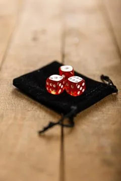 Dice are an important part of the tricks of magic artists, illusionists Stock Photos