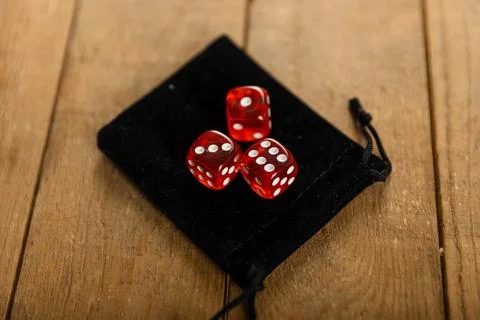 Dice are an important part of the tricks of magic artists, illusionists Stock Photos