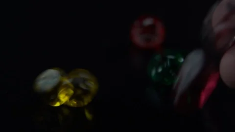Dice beeing cast close up black background Stock Footage 123048184